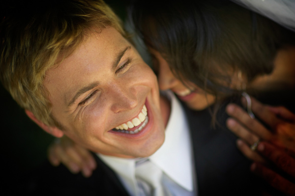 Smiling bride and groom - wedding photo by J Garner Photographer, 